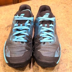 Black and blue Babolat tennis shoes